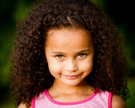 Outdoor portrait of pretty mixed race African-American girlの写真素材