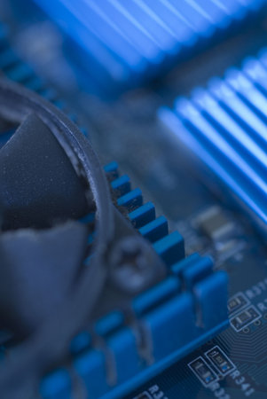 Details from a computer motherboard with a blue colorの写真素材