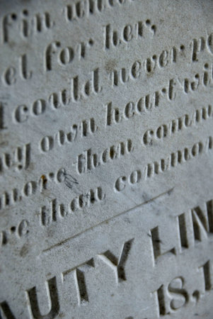 Detail of an old carved headstoneの写真素材