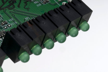 Close up detail of a Printed Circuit Board on a white background