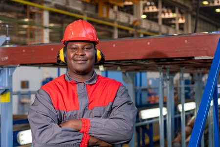 Young Black Worker In Personal Protective Equipment Looking At Camera. Portrait Of African American...