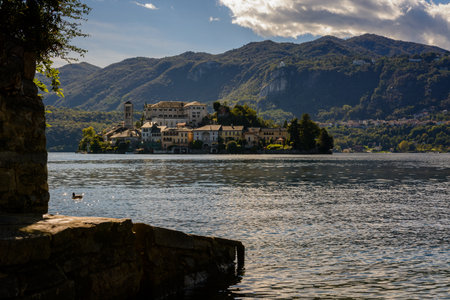 Lake Orta is known as the most romantic lake in Italy. located in Piedmont in northern Italy a few miles away from the largest and most famous lake Maggiore. In the middle of the lake there is the beautiful island of San Giulio.の写真素材