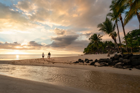 Panoramic footbridge over the indian ocean, Amazing flic en Flac beach at sunset, Mauritus island, Africa.の写真素材