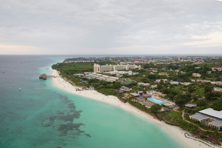 Awesome aerial view of coastline and turquoise ocean in Zanzibar at cloudy day, Tanzania.の写真素材
