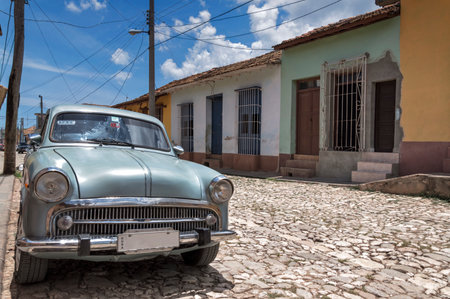 American car in the streets of the colonial city of Trinidad, Cubaのeditorial素材