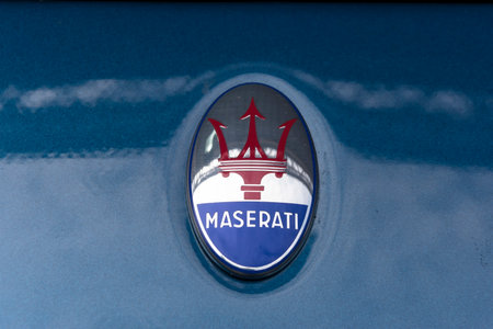 TURIN, ITALY - JUNE 13, 2015: Close-up of the classic Maserati logo on the body of a MC 12 modelのeditorial素材