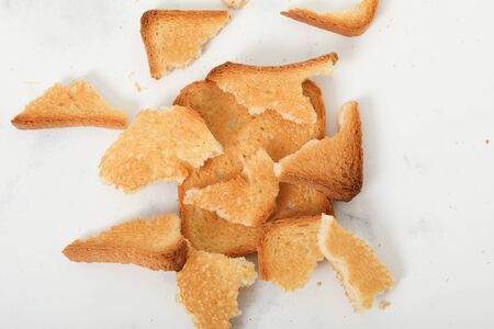 Toast biscuits over white background snack lunch