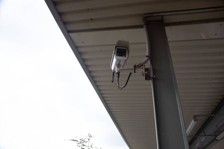 Silver CCTV Camera. Safety surveillance. Outdoor technology