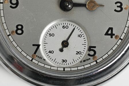 Pocket watch vintage clock . Chrome antique item on whiteの写真素材