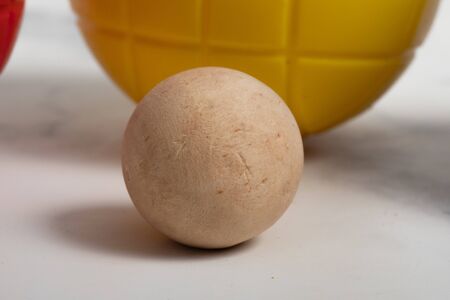 plastic colored ball for child. outdoor game on studio white backgroundの写真素材