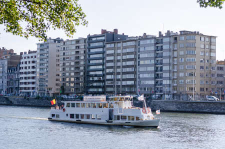 LiÃ¨ge, Belgium - August 22 2019: A ferry on the Meuse riverのeditorial素材