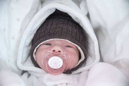 Baby with a teatの写真素材