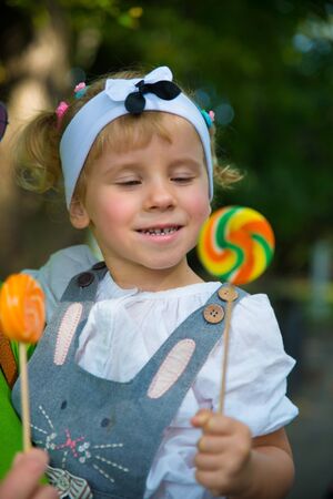 Girl with a lollipopの写真素材