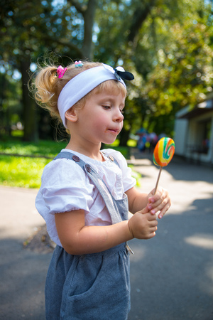 Girl with a lollipopの写真素材