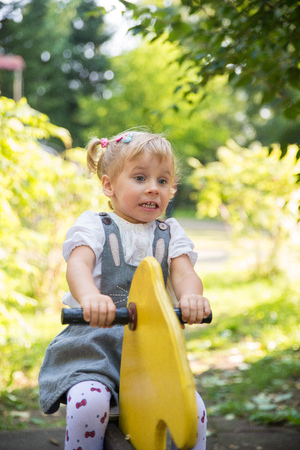 Little girl on the playgroundの写真素材