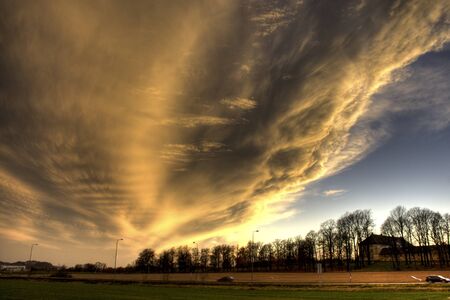 On a normal day coming home from work the clouds seemed almost like they had caught fire. This was taken just outside TÃ¸nsberg.の写真素材