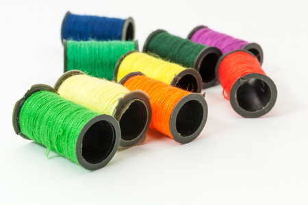 Collection of Colorful bobbin threads lying using for embroidery worksの写真素材