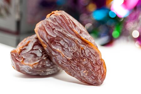 Two date fruits on colorful background.Ramadan Eid concept