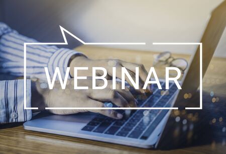 Businessman and team work using a Laptop Computer with Webinar E-business Browsing Connection and...