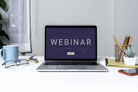 Work From Home with laptop computer for online training webinars. E-learning browsing connection and cloud online technology webcast concept. Laptop mockupの写真素材