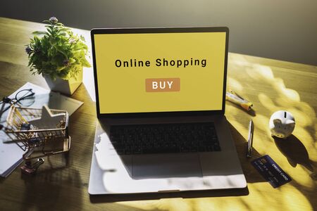 Businessman using laptop for online shopping and payment makes a purchase on the Internet, Online payment, Business financial and technology, mockupの写真素材