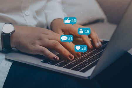 Businessman using laptop with social media for digital marketing online concept with notification...