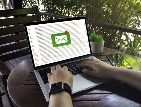 Business woman's hands are using Laptop Computer with E-Mail Communication Connection Message Online Chat Social Text Global Letters , business concept, Laptop mockupの写真素材