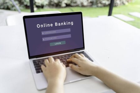 Businessman holding credit card and typing on laptop for online shopping and payment makes a purchase on the Internet, Online payment, Business financial and technology, mockupの写真素材