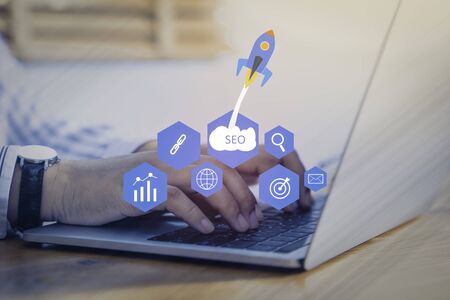 SEO Search Engine Optimization concept with laptop computer. ranking traffic on website, internet technology for business company.の写真素材