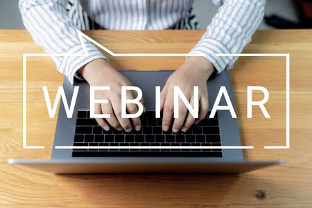 Businessman and team work using a Laptop Computer with Webinar E-business Browsing Connection and cloud online technology webcast concept.の写真素材