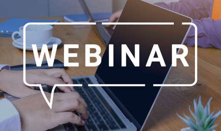 Businessman and team work using a Laptop Computer with Webinar E-business Browsing Connection and...