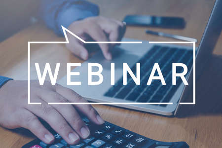 Person using a laptop computer for online training webinars. E-learning browsing connection and...