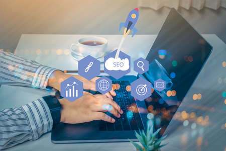 SEO Search Engine Optimization concept with laptop computer. ranking traffic on website, internet...