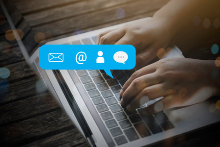 Contact us or Customer support hotline people connect. Businessman using a laptop computer with the...