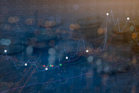 Double exposure with graph and rows of coins for finance and business background concept.の写真素材