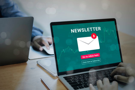 Businessman and team work using a Laptop Computer with Subscribe newsletter and Email marketing strategy business concept.の写真素材