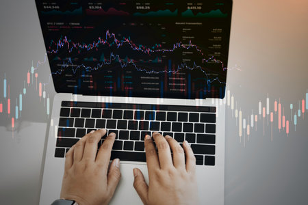 Business people using Laptop with various type of financial and investment products in Bond market. i.e. Crypto Currency, bonds, stocks. Sustainable portfolio management.の写真素材