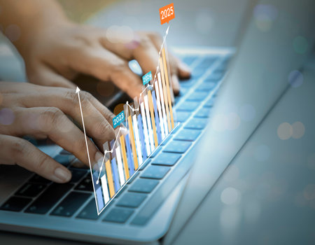 Businessman using laptop with analyzing forex trading graph financial data. business finance technology and investment concept. Stock Market Investments funds Business finance background.の写真素材