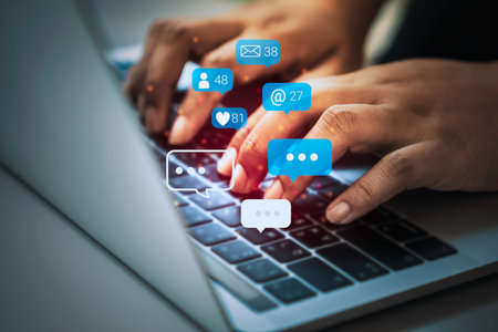 Contact us or Customer support hotline people connect. Business people using a laptop computer with the (email, call phone, mail) icons.の写真素材