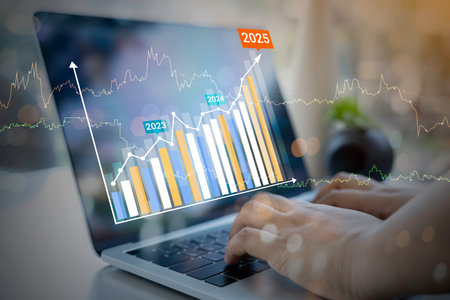 Businessman using laptop with analyzing forex trading graph financial data. business finance technology and investment concept. Stock Market Investments funds Business finance background.の写真素材