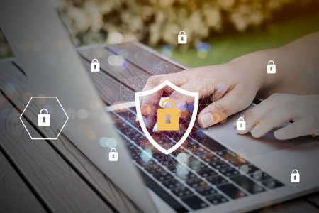 Laptop Computer with Data protection, Cyber security, information safety and encryption concept. internet technology and business concept.の写真素材