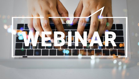 Person using a laptop computer for online training webinars. E-learning browsing connection and cloud online technology webcast concept. Laptop mockup with path on screen.の写真素材