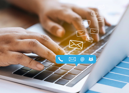 Contact us or Customer support hotline people connect. Business people using a laptop computer with...