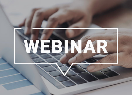Person using a laptop computer for online training webinars. E-learning browsing connection and cloud online technology webcast concept. Laptop mockup with clipping path on screen.の写真素材