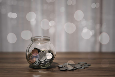 Saving money investment and Business finance, Money coin stack growing graph with piggy bank saving concept.の写真素材
