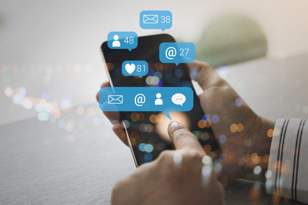 Contact us or Customer support hotline people connect. Business people using a smartphone with the (email, call phone, mail) icons.の写真素材
