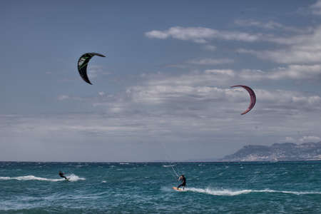 Kitesurfing in the Mediterranean Sea. Kitesurfing is a popular sport in Spain.