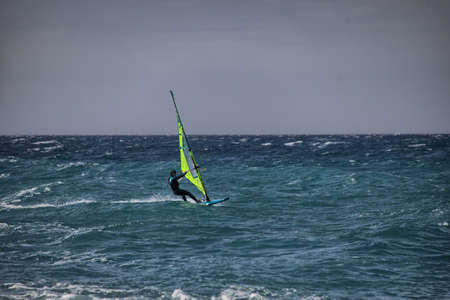Windsurfers in the Atlantic Ocean in Tenerife Canary Islands Spainの写真素材