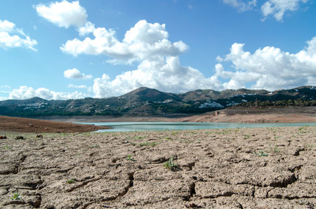 Landscape with dry cracked earth at the bottom swamp. Droughtの写真素材