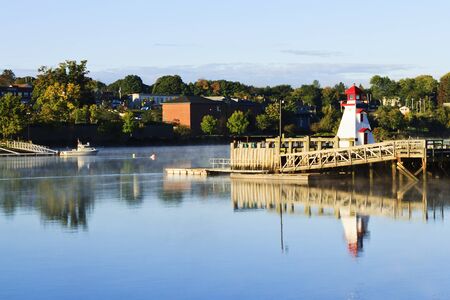 town wharf with lighthouse replicaの写真素材